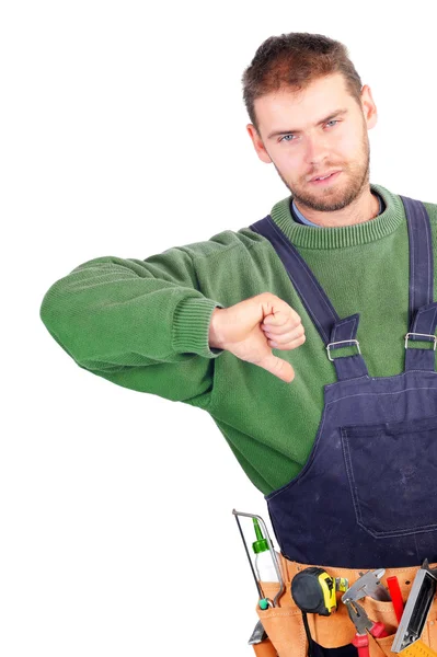 Real handsome carpenter showing thumb down — Stock Photo, Image