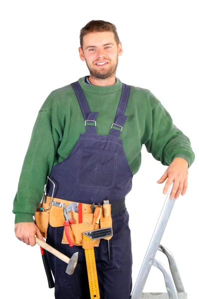 Real carpenter standing on a ladder — Stock Photo, Image