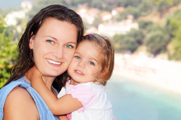 Happy child with her mother — Stock Photo, Image