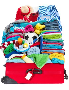 Travel suitcase packed for vacation in sea resort clipart