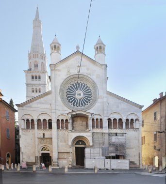 Outside the cathedral of Modena clipart