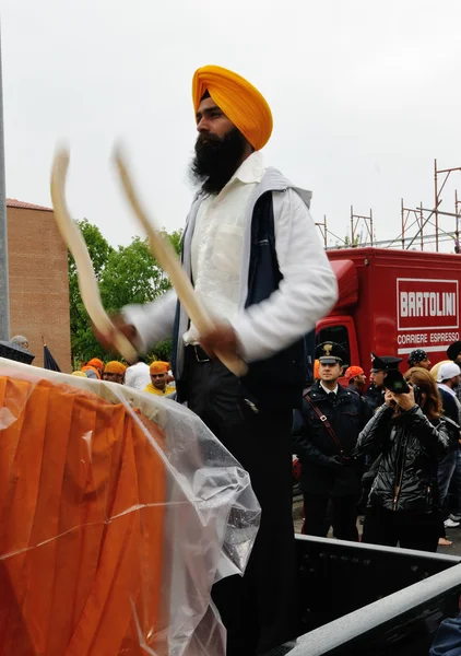 Sikh drummer at 2012 Baisakhi festival in Brescia