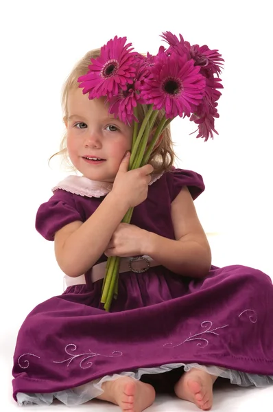 Küçük kız ve çiçekler — Stok fotoğraf