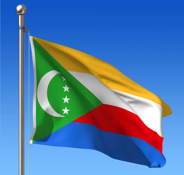 Flag of Comoros against blue sky. — Stock Photo, Image