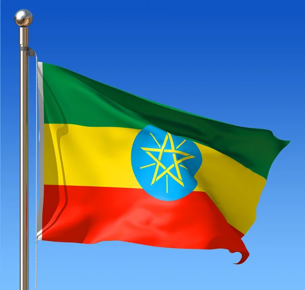 Vlag van Ethiopië tegen blauwe hemel. — Stockfoto