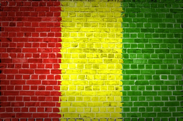 Кирпичная стена Гвинеи — стоковое фото