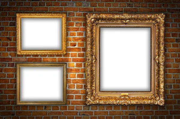 Red Brick Wall with blank frames — Stock Photo, Image