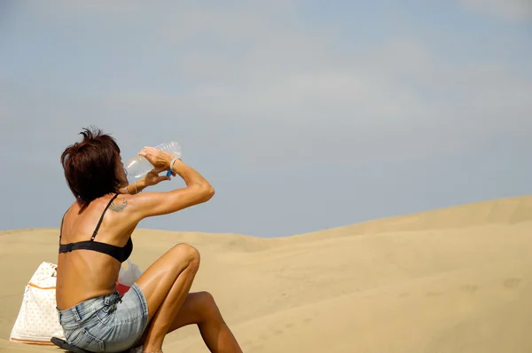 stock image Woman, water and desert