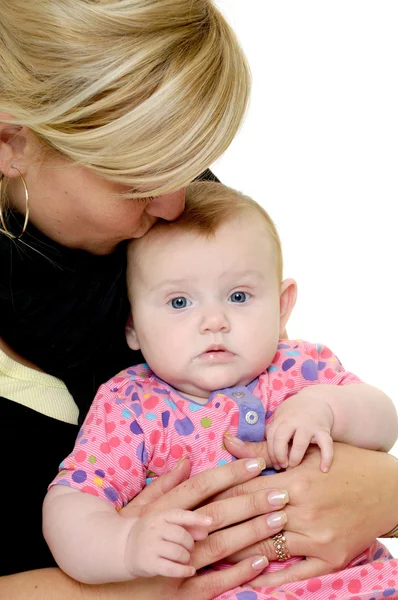 Mother is kissing baby — Stock Photo, Image