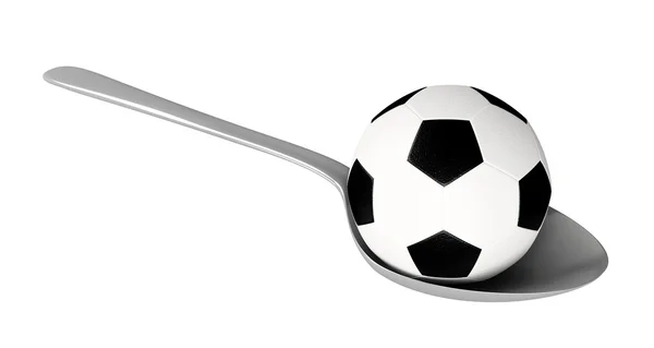 Футбольный мяч и ложка — стоковое фото