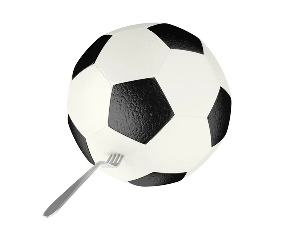 Футбольный мяч и вилка — стоковое фото
