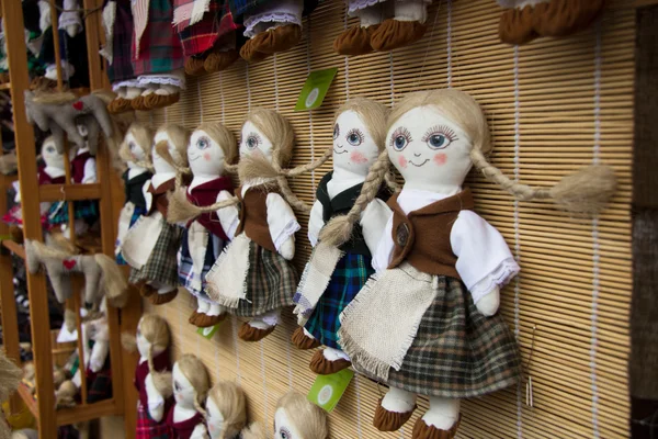 Hand made dolls at market Stock Picture