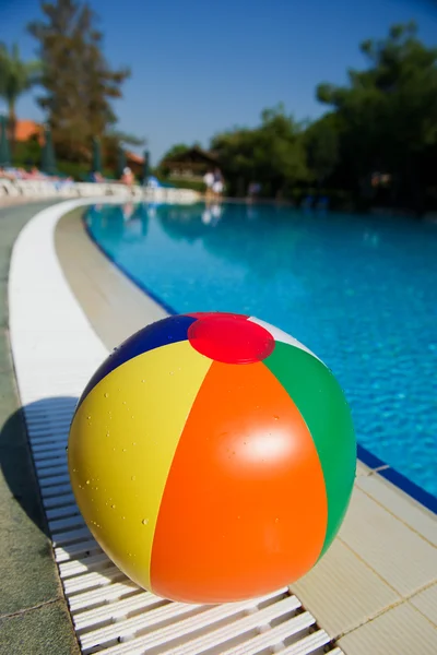 Beach ball at swimming pool — Stock Photo, Image