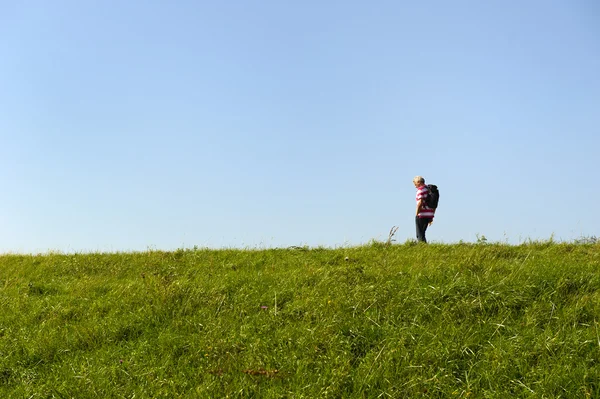 stock image Man walking at dike