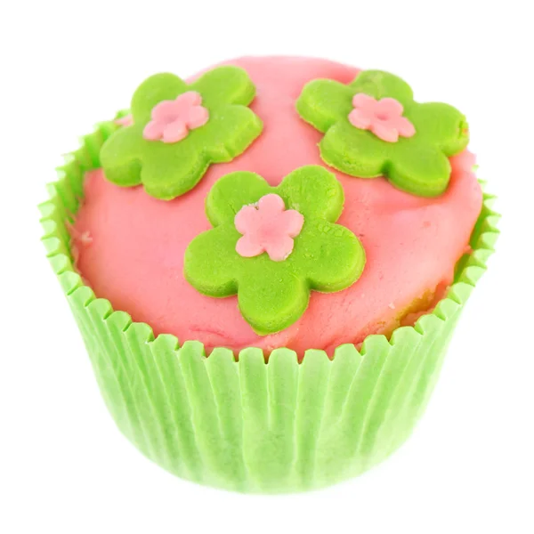 Ізольований зелений і рожевий кекс — стокове фото