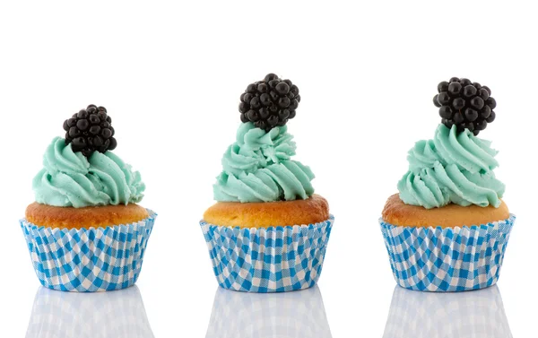 Cupcake in blau und grün mit Früchten — Stockfoto