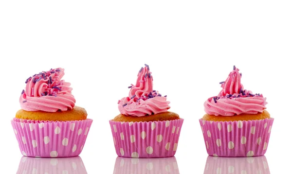 Cupcake rosa con spruzzi viola — Foto Stock