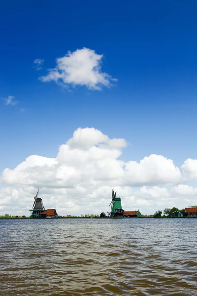 Dutch windmills at the river — Stock Photo, Image
