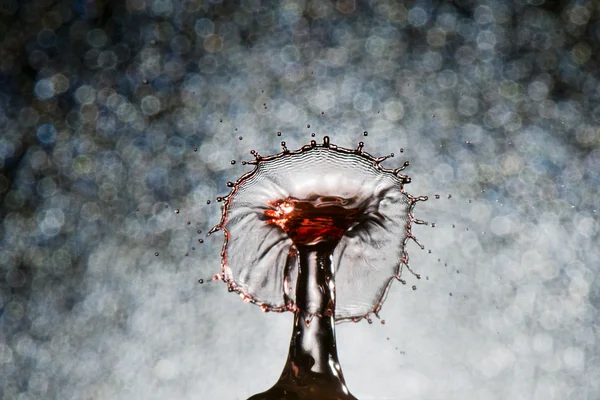 Soyut su sıçrama kırmızı — Stok fotoğraf
