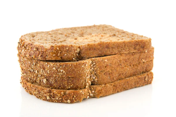 Slices dark brown bread with cereals — Stock Photo, Image