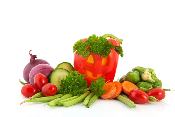 Funny paprika with vegetables — Stock Photo, Image