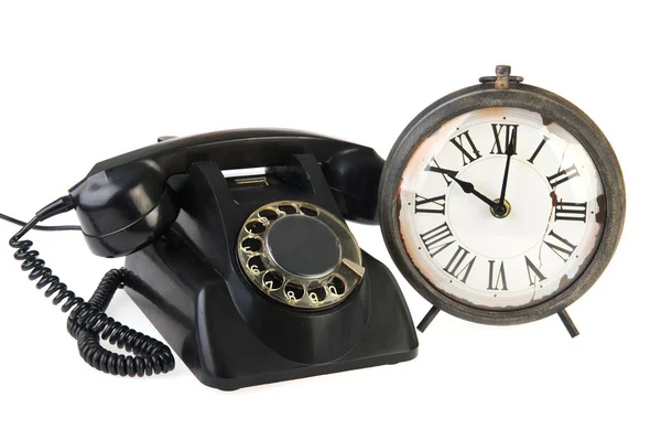 Vintage telephone and clock — Stock Photo, Image