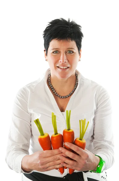 Mujer con zanahorias — Foto de Stock
