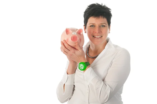 Woman is holding piggy bank — Stock Photo, Image