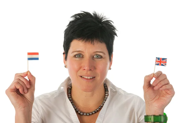 Mujer joven con banderas holandesas inglesas — Foto de Stock