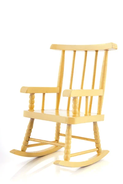 Желтое кресло-качалка — стоковое фото