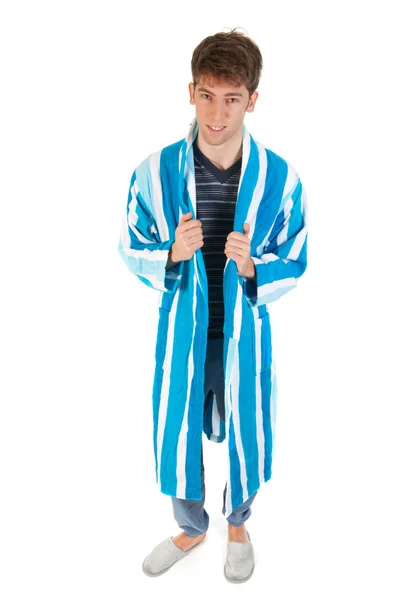 Молодой человек в пижаме и халате — стоковое фото