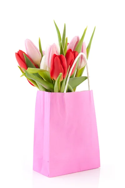 Saco de compras rosa com tulipas — Fotografia de Stock