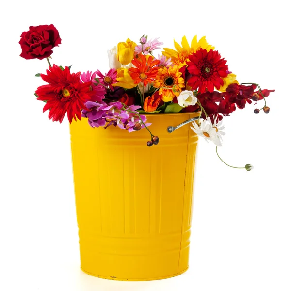 Yellow trash can flowers — Stock Photo, Image