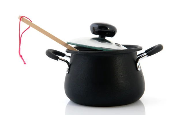 Küchentopf mit Kochlöffel — Stockfoto