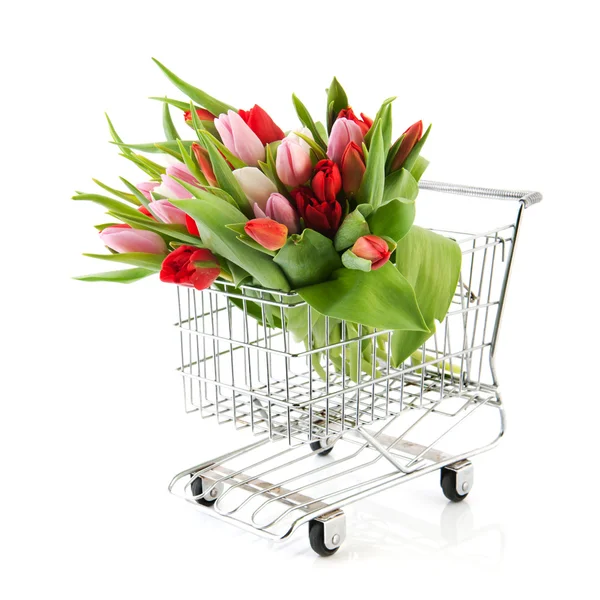 Shopping cart with flowers — Stock Photo, Image