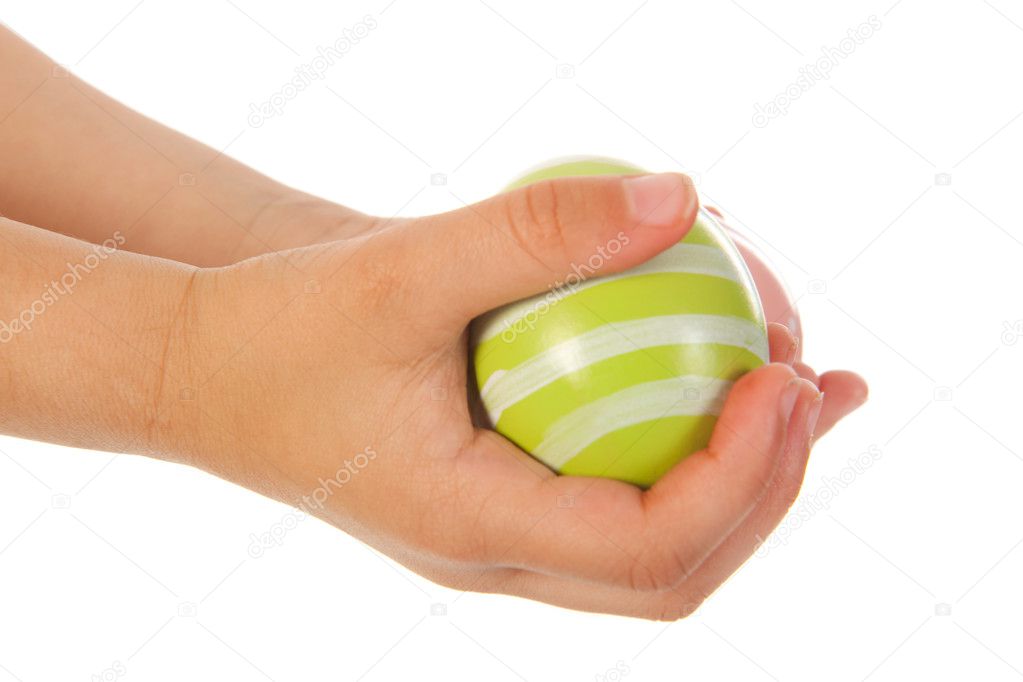 Child hands with easter eggs