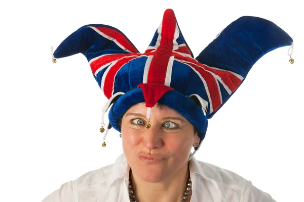 Woman with cross eyes to Brittain funny hat — Stock Photo, Image