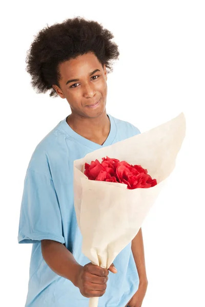 Negro adolescente chico es dando flores —  Fotos de Stock