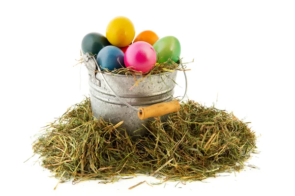 Sinc kbelík barevný velikonoční vajíčka — Stock fotografie