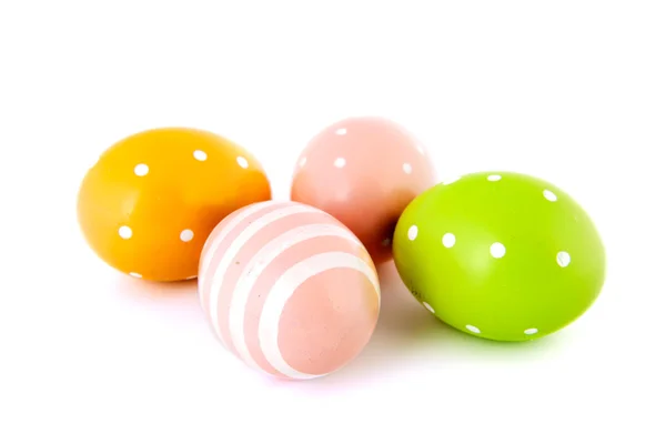 Ovos de Páscoa em amarelo rosa e verde — Fotografia de Stock