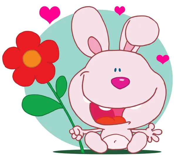 Rosa bunny innehar blomma — Stockfoto