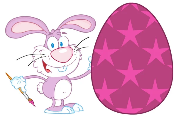 Happy Rabbit Painting Easter Egg With Stars — Stock Photo, Image