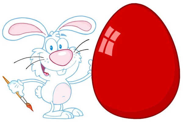 Happy Rabbit Painting Red Easter Egg — Stock Photo, Image