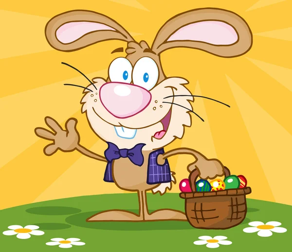 Waving Brown Bunny With Easter Eggs And Basket — Stock Photo, Image