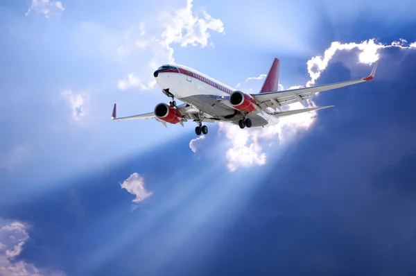 Zon achter en vliegtuig — Stockfoto
