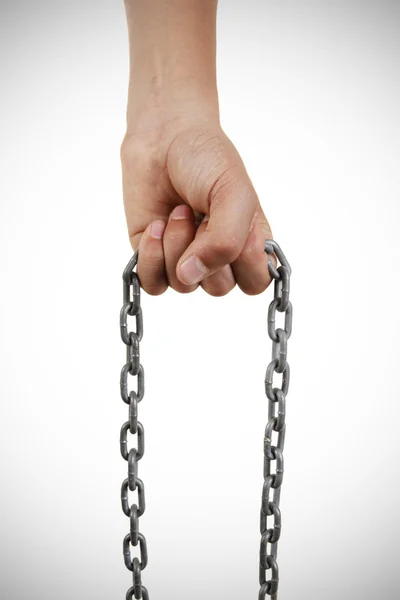 Young boy's hand holding a chain — Stock Photo, Image