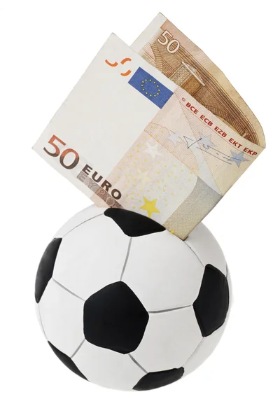 stock image Fifty euro going into football money box