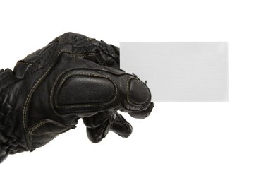 Visit card in man's hand with motorcycle glove clipart