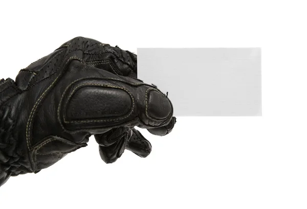 Визитная карточка в мужской руке с мотоциклетной перчаткой — стоковое фото