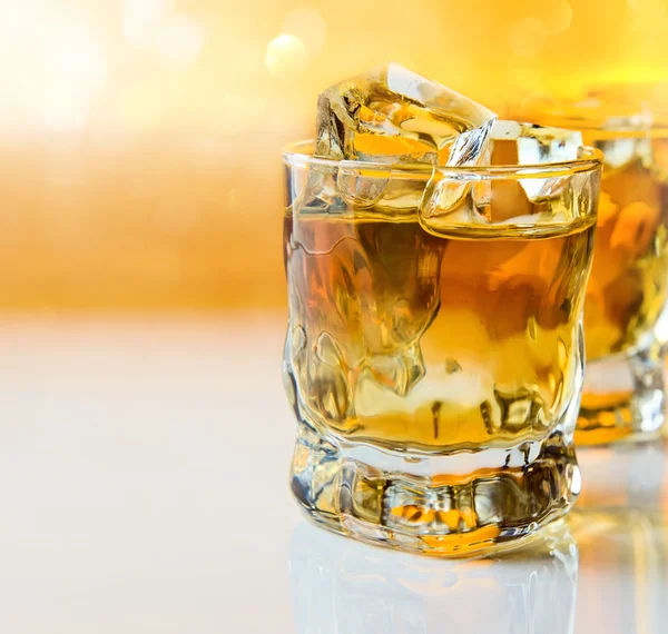 stock image Whisky with ice .